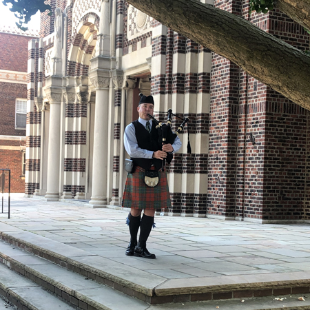 Bagpiper Playing at Funeral