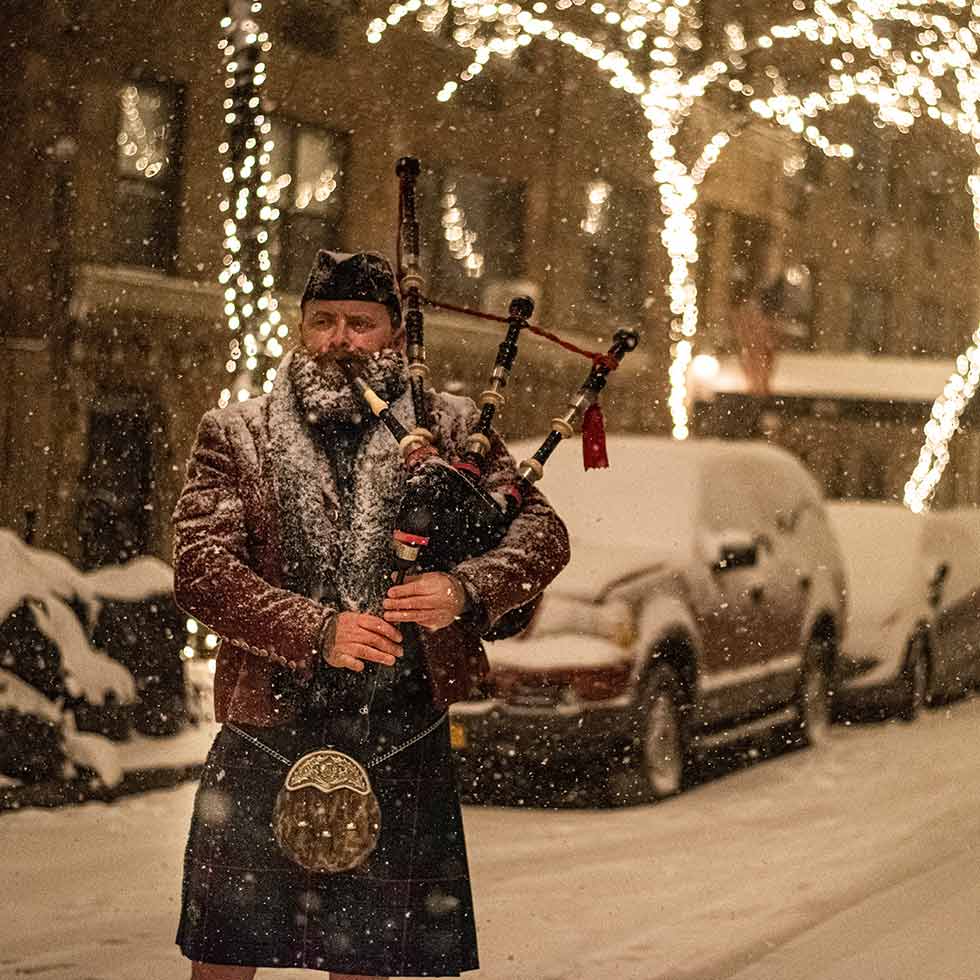 Bagpiper Playing in the Snow in NYC